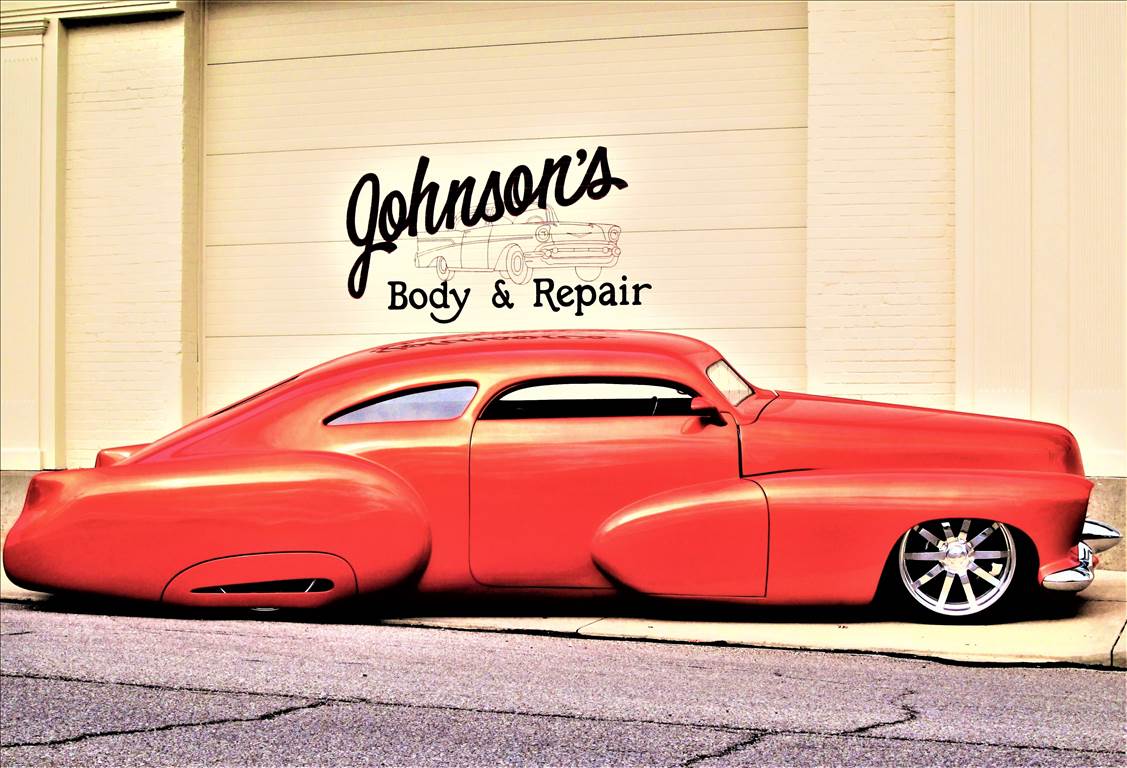 Gary Johnson, Mike Johnson, and Kathy Kruty at Johnson's Auto Body